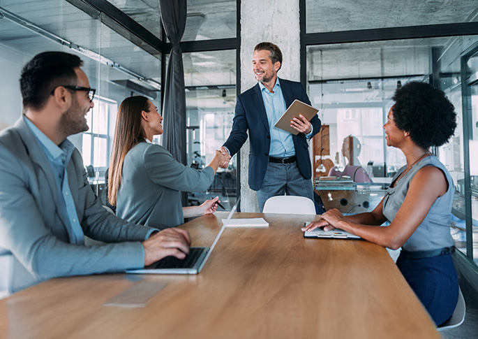 Willkommenssituation in einem Besrechungszimmer